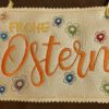Türschild / Wandhänger "Frohe Ostern" mit Blüten