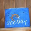 "Seebär" mit Steuerrad