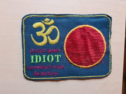 Mugrug "OM - Idiot" – Bild 3